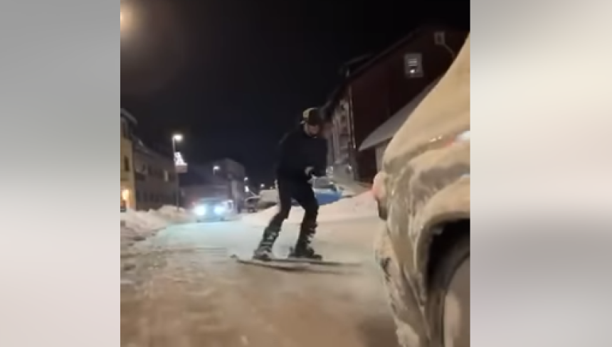 Скијао по улици закачен за ауто (ВИДФЕО)