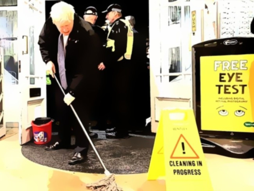 Премијер Џонсон се латио крпе након поплава