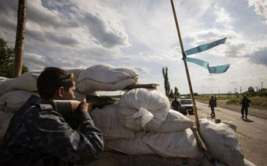 Повлачење тешке артиљерије из Донбаса