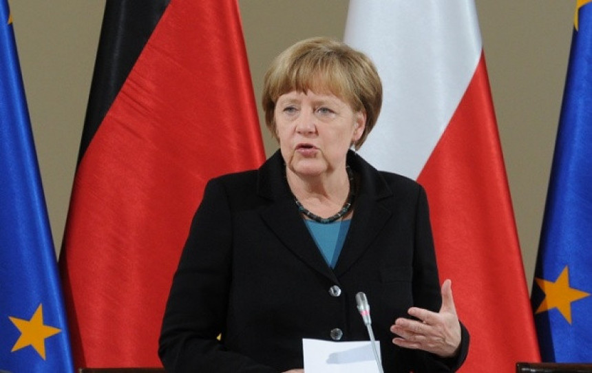 Меркел: Санкције Русији док се не испуни договор из Минска