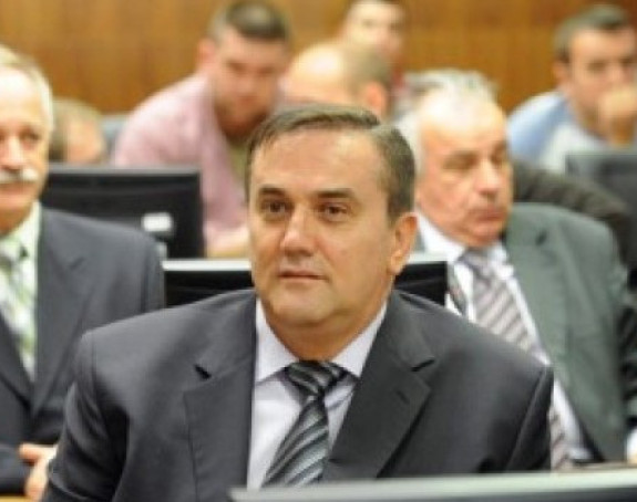 Dodik da pozove Radišića da se preda  