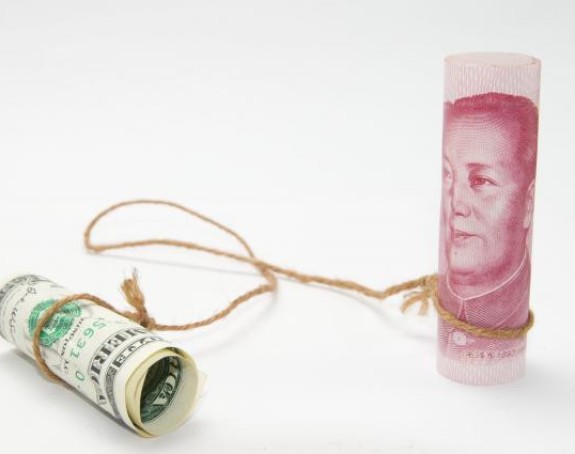 Потез Кине срозао долар, јуан слави