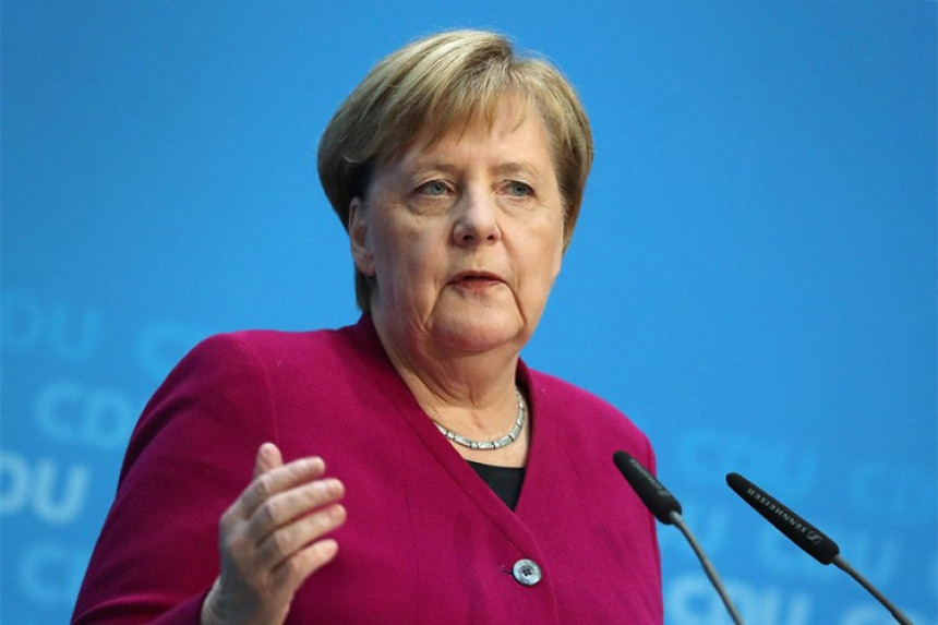 Angela Merkel objavila "rat" Donaldu Trampu