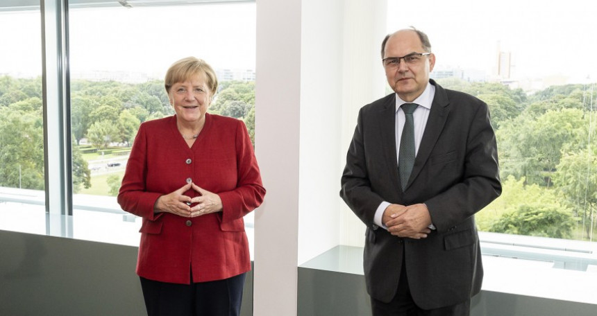 Šmit se sastao sa Merkelovom, dobio podršku za rad
