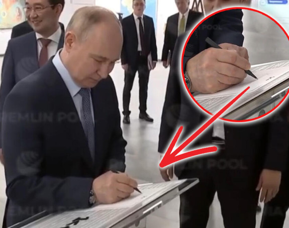 Путин, непослушна оловка и хитро обезбјеђење (ВИДЕО)