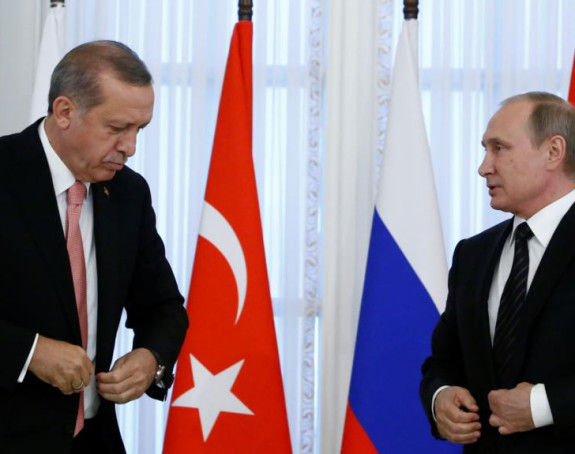 Kurdi pale slike Erdogana i Putina